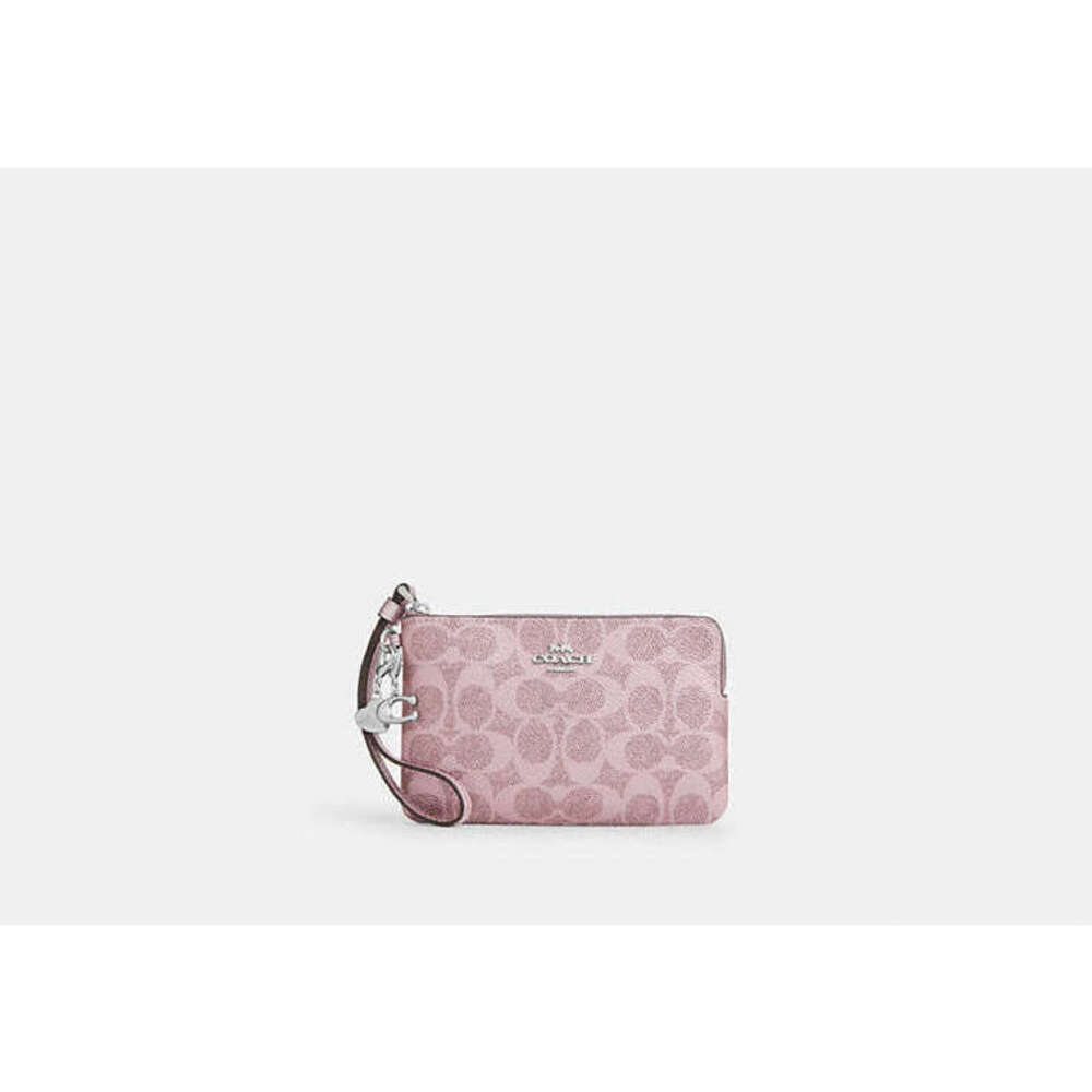 COACH Wristlet In Signature Pink Canvas w/Charms. Gift boxed NWT - Picture 2 of 3